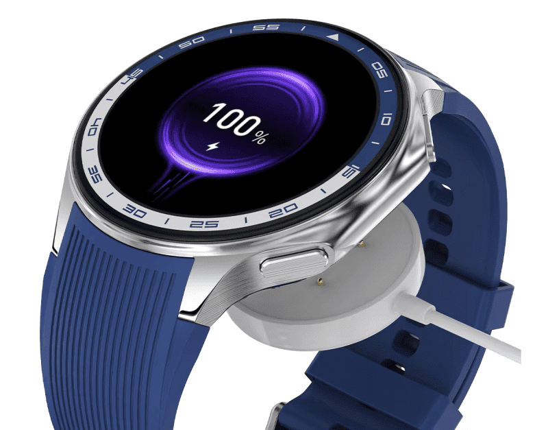 Smartwatch z funkcją ładowania bezprzewodowego i wyświetlaczem pokazującym 100% naładowania baterii.